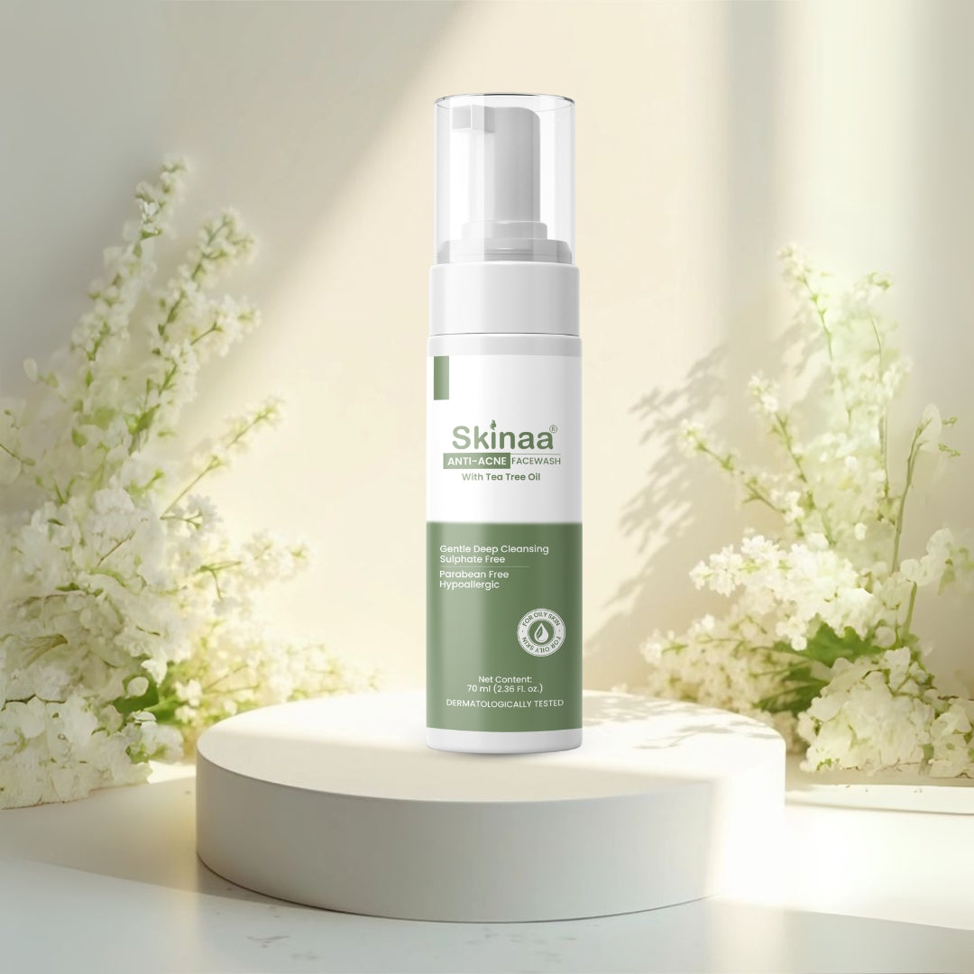 Skinaa Anti-Acne Foaming Face Wash with Tea Tree Oil – gentle cleanser for acne-prone skin, reduces breakouts, controls excess oil, and soothes irritation, product display with floral background