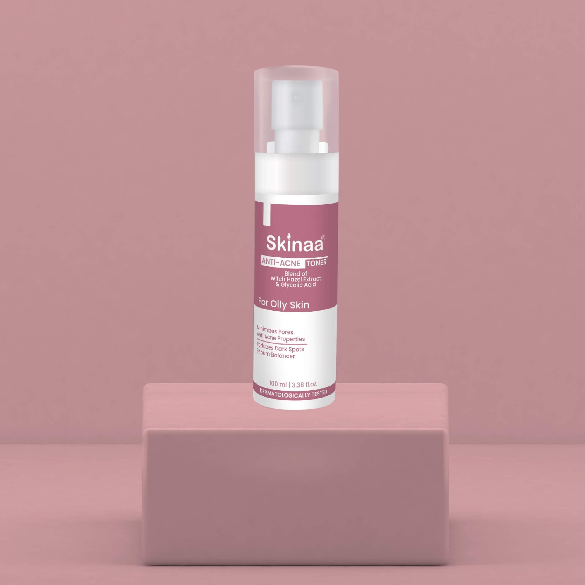 Skinaa Anti-Acne Toner for oily skin – dermatologist-tested toner that helps reduce acne, minimize pores, and balance excess oil, displayed on a minimal pink background