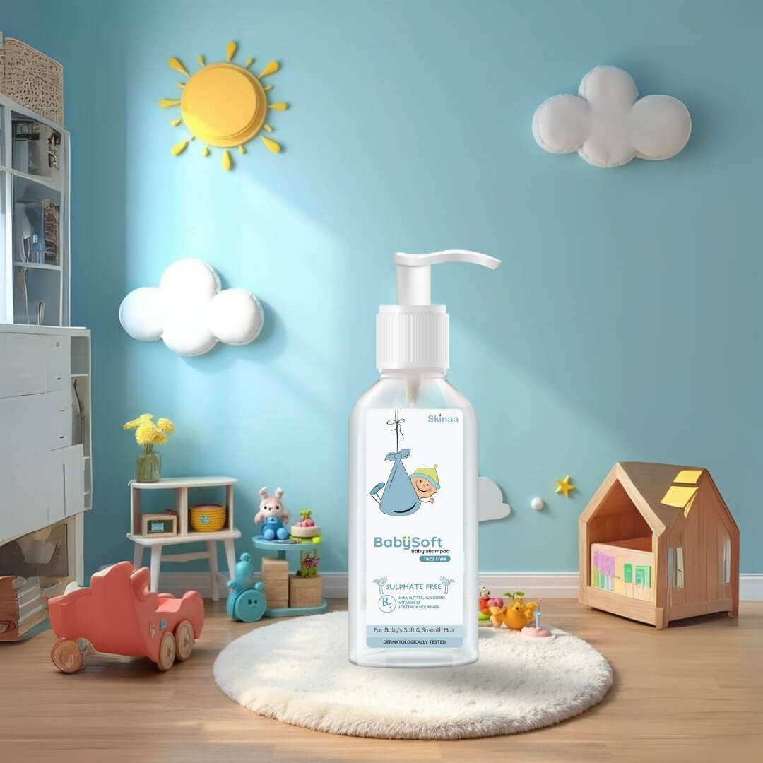 Skinaa BabySoft Baby Lotion bottle with pump placed in a bright, playful nursery setting with blue walls, sun and cloud wall décor, wooden toys, and a dollhouse.