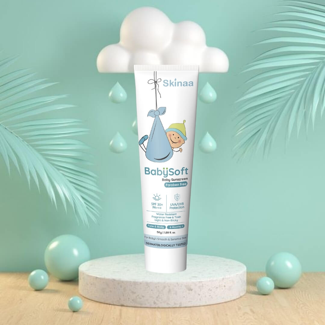 Skinaa BabySoft Baby Sunscreen SPF 30+ PA+++ for gentle UVA and UVB protection, displayed on a playful cloud and aqua background