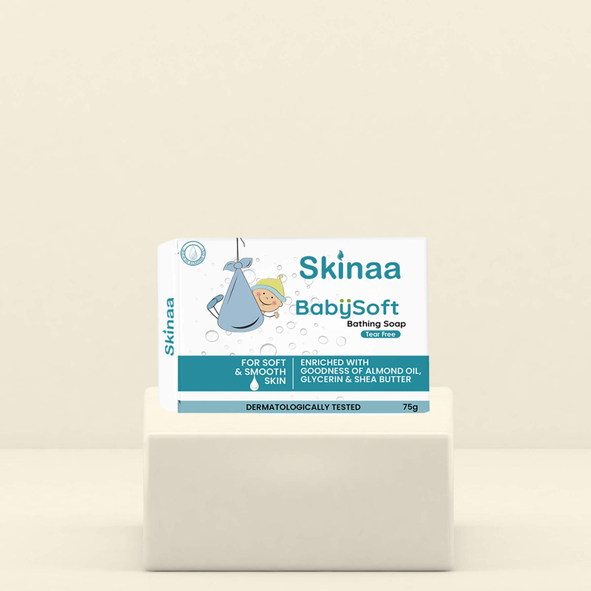 Skinaa BabySoft Bathing Soap pack placed on a white pedestal, designed for babies with almond oil, glycerin, and shea butter for soft and smooth skin.