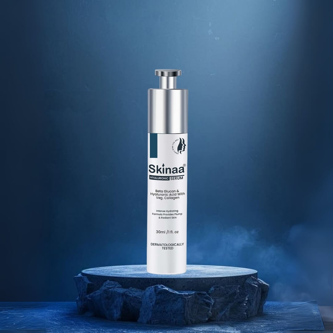 Skinaa Hyaluronic Serum bottle placed on a rocky pedestal with a glowing blue background, formulated for deep hydration, skin plumping, and collagen boost