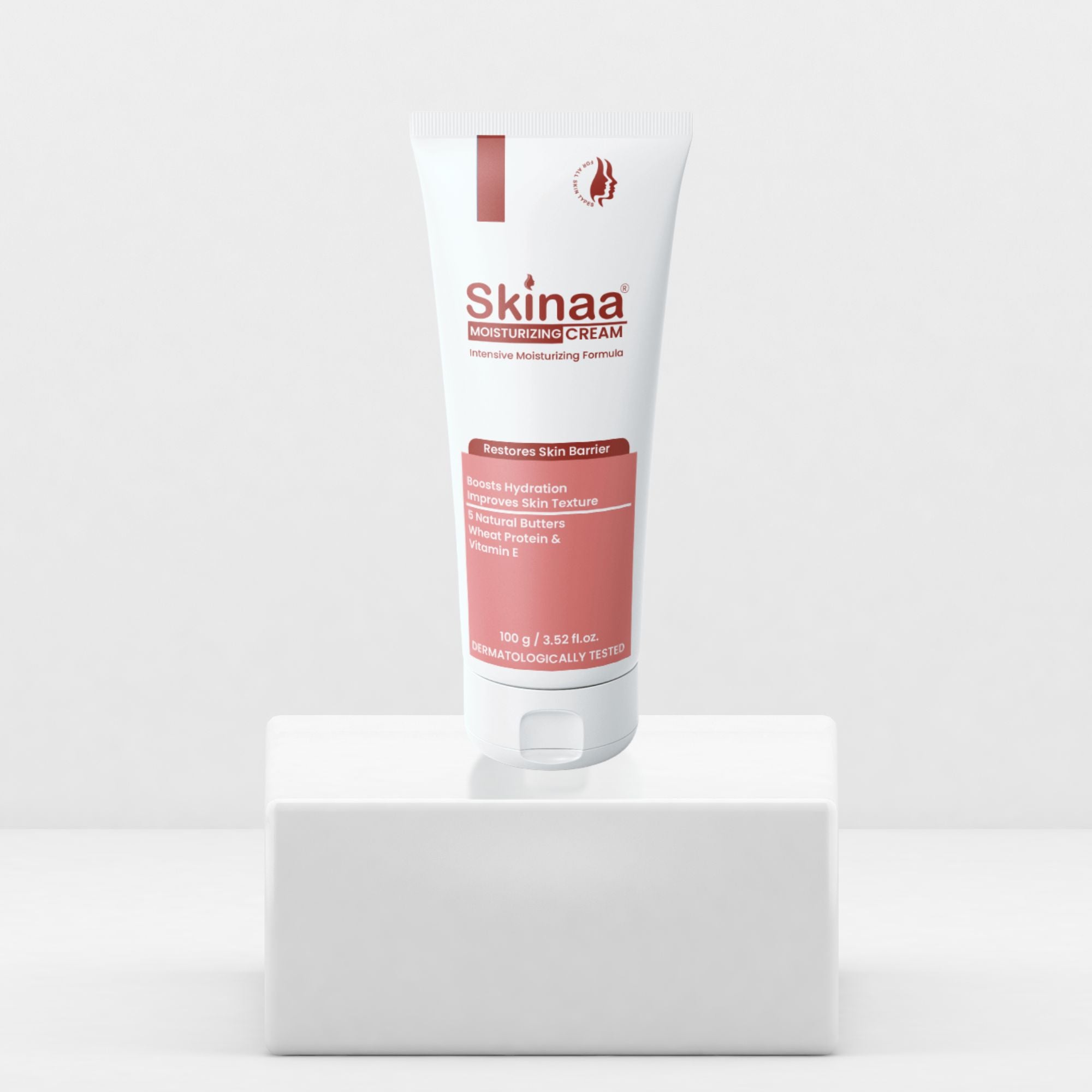 Skinaa Moisturizing Cream tube displayed on a white pedestal with minimal background, dermatologically tested cream for hydration and skin barrier repair