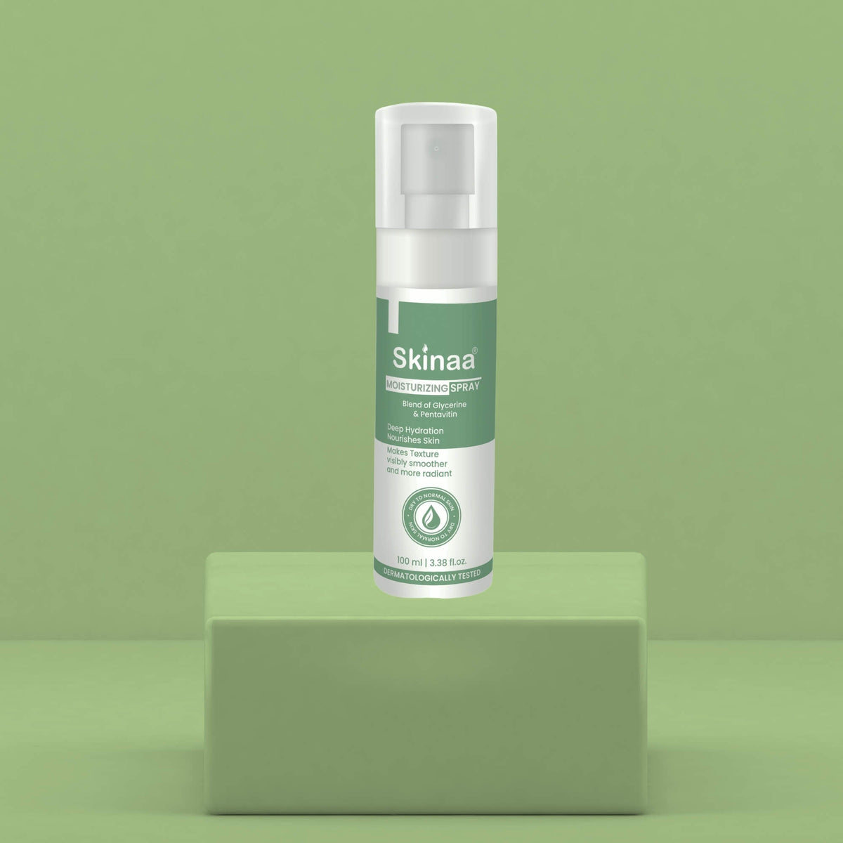 Skinaa Moisturizing Spray bottle displayed on a green background, lightweight hydrating mist for soft, refreshed, and glowing skin