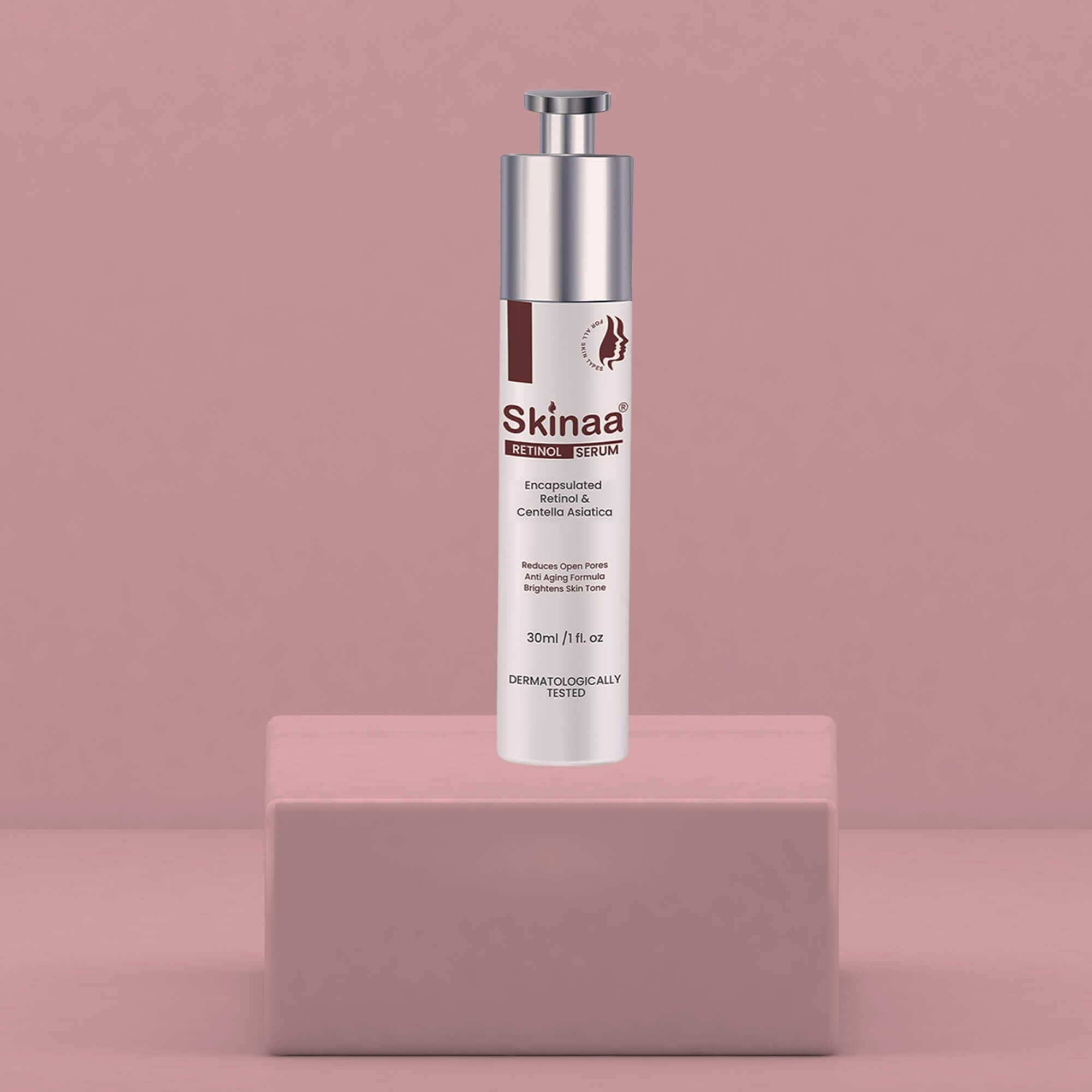 Skinaa Retinol Serum bottle displayed on a pink pedestal with soft pink background, designed for anti-aging, skin renewal, and brightening effects
