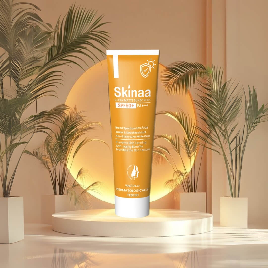 Skinaa Ultra Matte Sunscreen Gel SPF 50+ PA+++ tube displayed on a glowing podium with tropical plants, dermatologically tested sunscreen for sun protection and matte finish