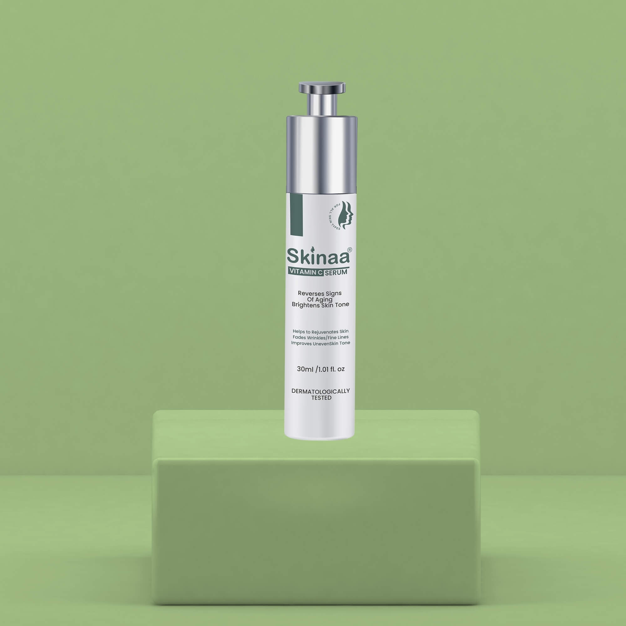 Skinaa Vitamin C Serum bottle placed on a green podium with matching background – brightening and dark spot reduction face serum for glowing, even skin tone